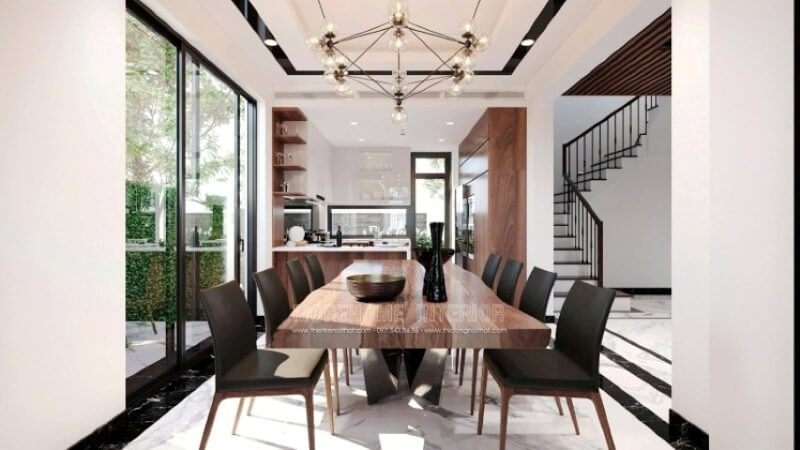 Thiết kế nội thất phòng ăn sang trọng từ đồ nội thất cao cấp: bàn gỗ óc chó nguyên tấm, ghế gỗ hiện đại trên nền đá hoa cương .