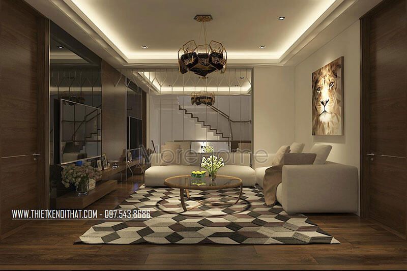 Phòng khách sử dụng bức tường gương kính giúp diện tích phòng được nhân rộng hơn.
